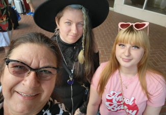 Debra poses in a photo with her daughters. She's incredibly proud.