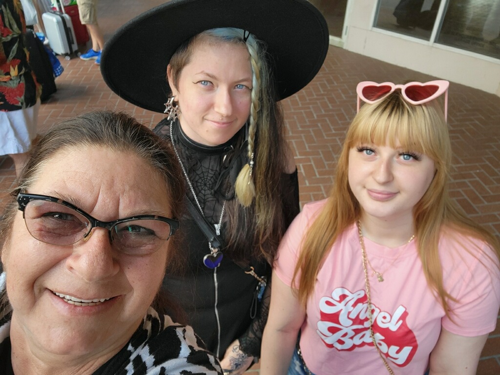 Debra poses in a photo with her daughters. She's incredibly proud.